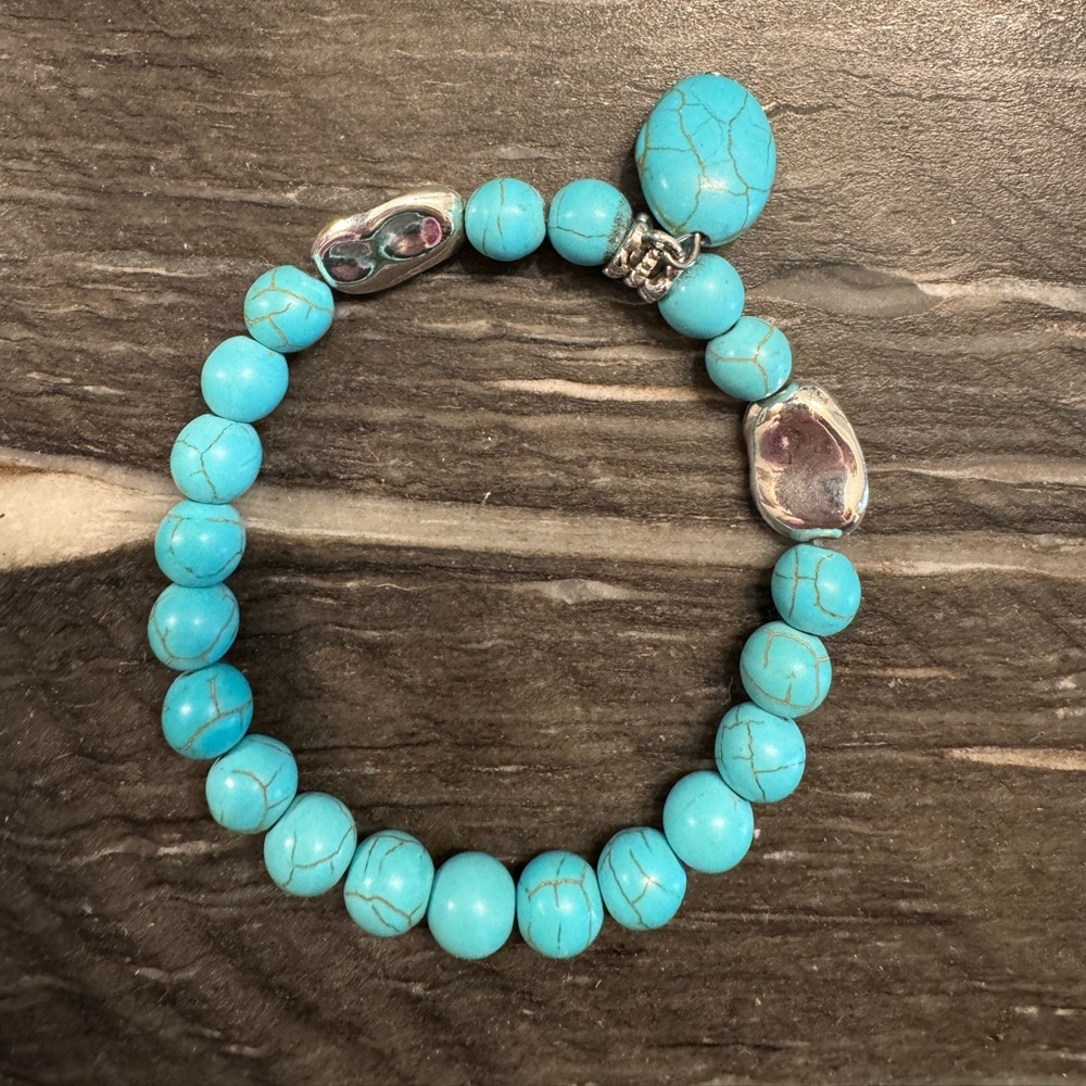 Turquoise Colored Beaded Bracelet with Silver Accents